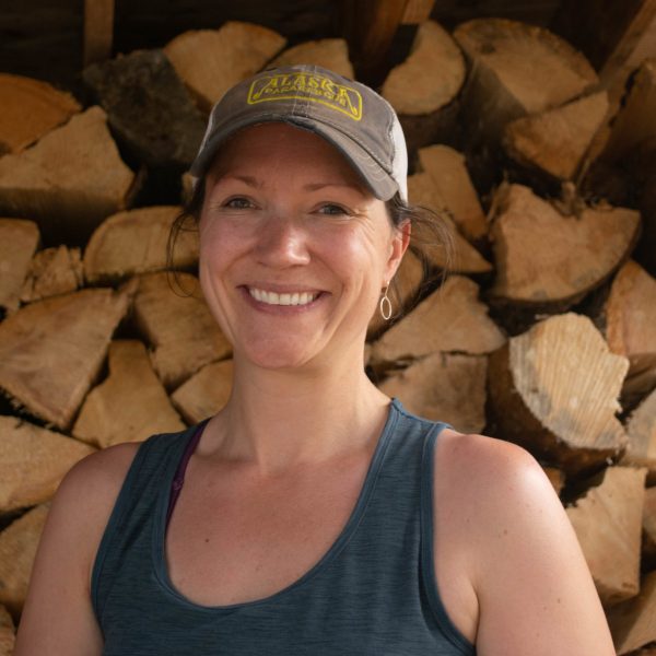 a person sitting on a rock