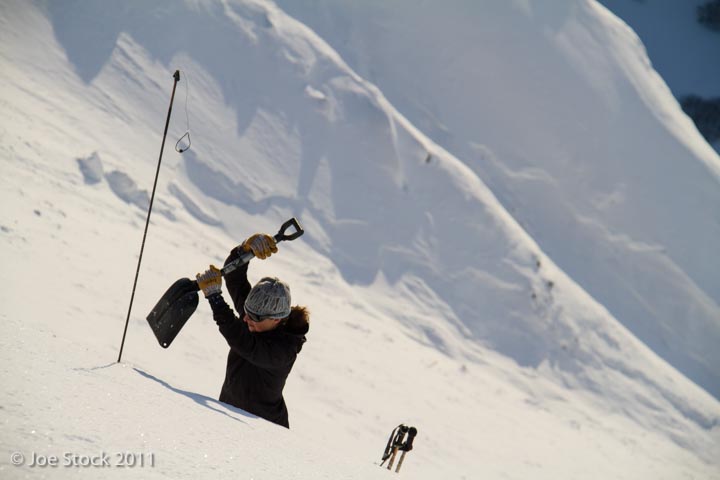 a man skiing down a snow covered slope