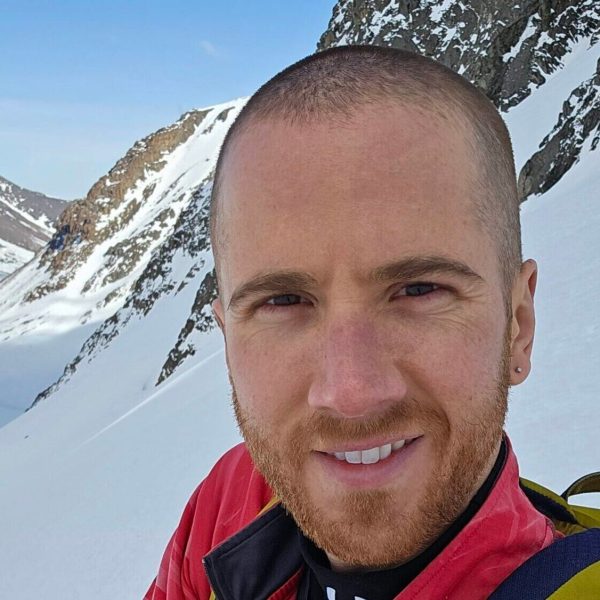 a man smiling for the camera